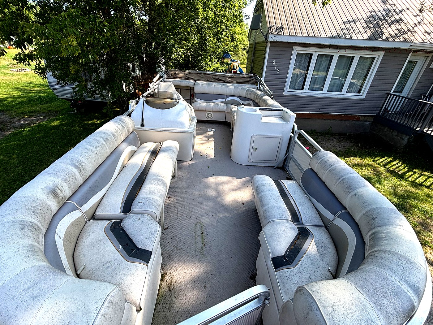 Before pontoon boat detailing North Bay — dirty seats and floor