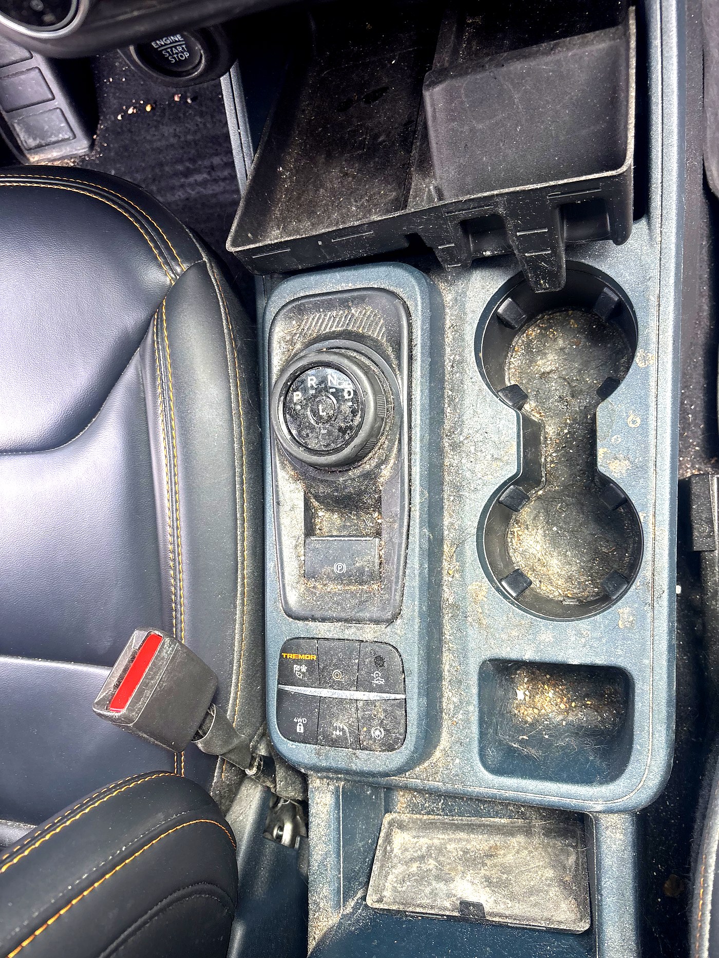 Before Ford Maverick console detailing North Bay — filthy cup holders